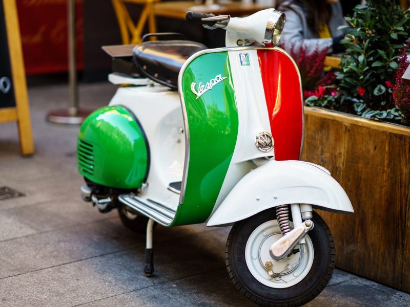 London, UK - October 20, 2018: Vintage Vespa Scooter parked on London Street